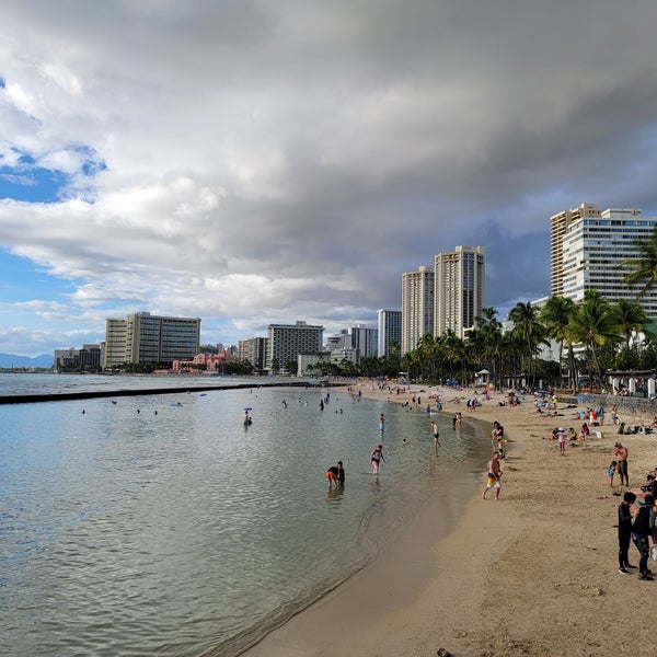 Photo taken at Waikiki Beach Walls by Aloha B. on 1/1/2023