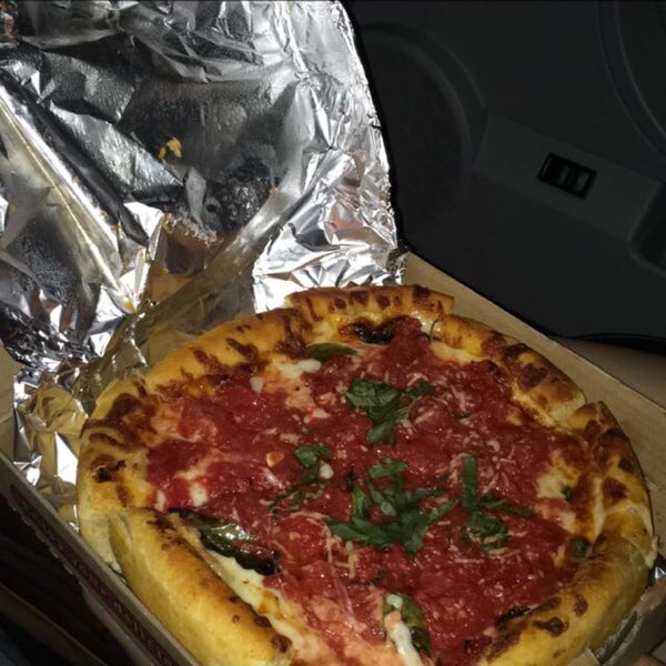 I got a small deep dish cheese pizza with basil and practically went to heaven. The crust was flaky and buttery, cheese gooey and chewy, thick and plump tomato chunks, and the perfect amount of garlic