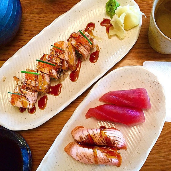 Photo taken at Sushi Planet by Dasha on 2/16/2015