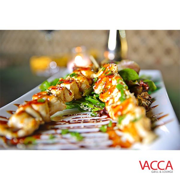 Photo taken at Vacca Grill &amp; Lounge by Vacca Grill &amp; Lounge on 12/23/2014
