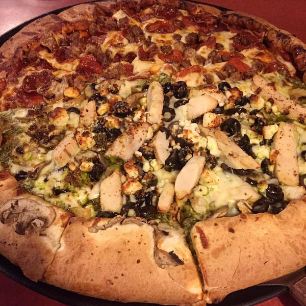 Photo taken at Woodstock&#39;s Pizza by CCC F. on 2/10/2016