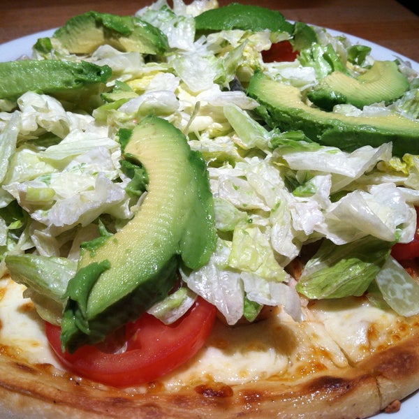 Photo taken at California Pizza Kitchen by Natalia C. on 5/5/2013