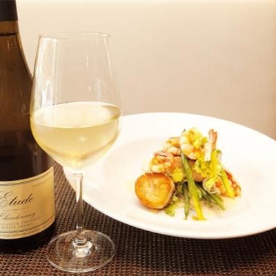Here's a recommendation from our food/wine pairing column: try the Mesquite Grilled Lois Lake Salmon with the Etude Estate Chardonnay! Why? Take a look at the column and find out!