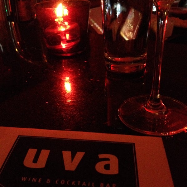 Photo taken at Uva Wine &amp; Cocktail Bar / Cibo Trattoria by Cameron W. on 1/18/2015