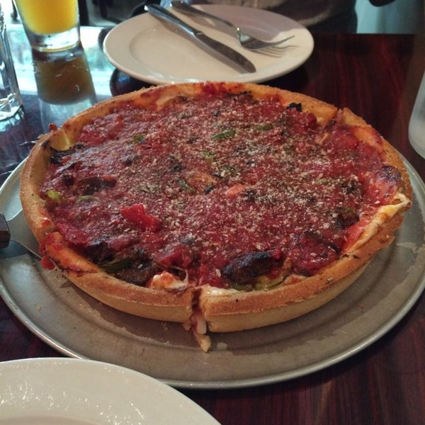 Photo taken at Kylie&#39;s Chicago Pizza by Daigo I. on 6/1/2014