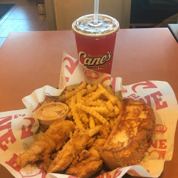 Photo taken at Raising Cane&#39;s Chicken Fingers by Sam A. on 3/1/2020