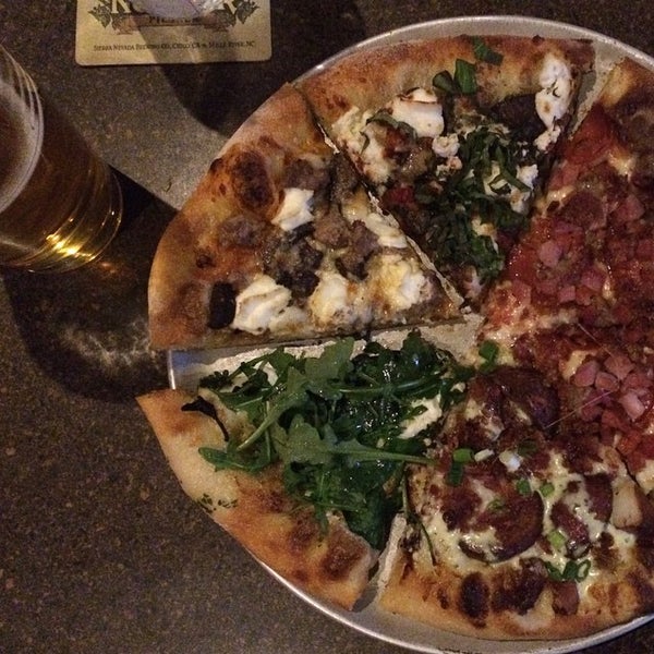 Photo taken at Rockstone Pizzeria &amp; Pub by Marianne H. on 3/8/2015