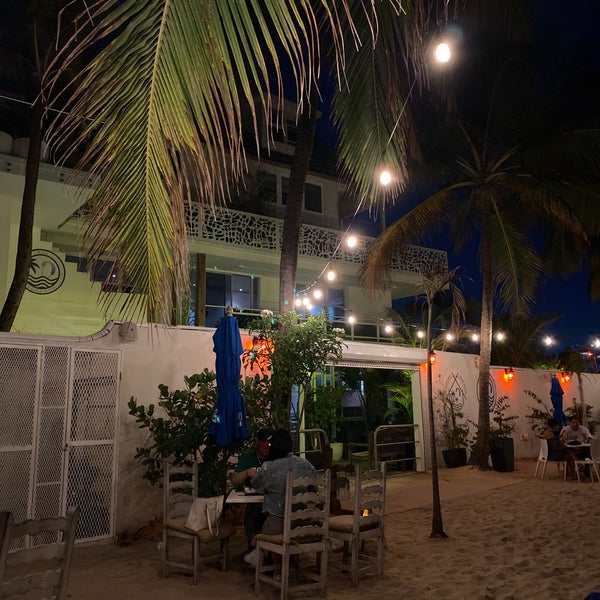 Photo taken at Numero Uno Beach House Bar + Kitchen by Gonçal B. on 5/29/2021
