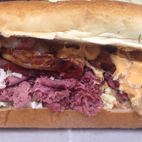 Pastrami Tsunami Hero with Pastrami, Ovengold Turkey, Bacon, Cole Slaw and Russian Dressing