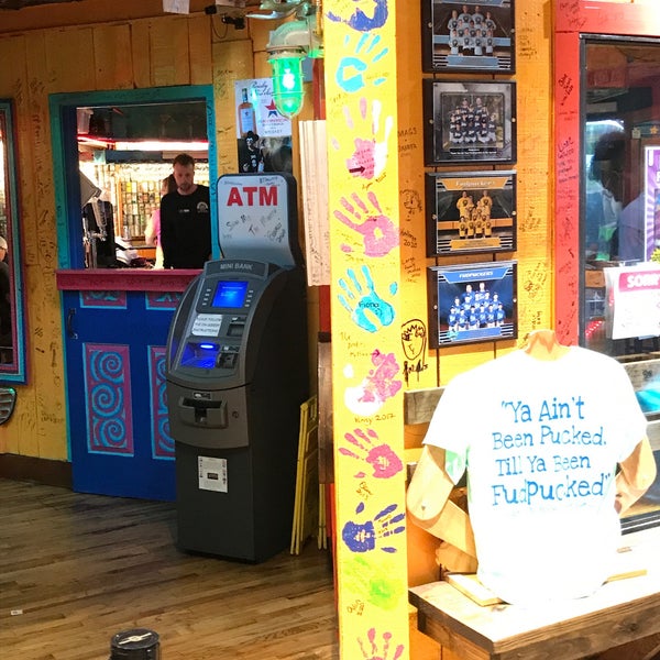 Photo taken at Fudpuckers Beachside Bar &amp; Grill by Andy M. on 7/29/2020