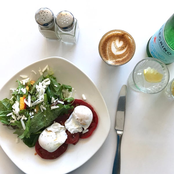 Good morning . . . in CA we eat our greens for breaky. This is the "2 Farm Eggs Poached w/salad of Heirloom Tomatoes, Greens, Nectarines, Cucumbers, Ricotta Salata & Sherry Vin" and my #dailycortado