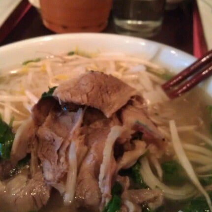 Photo taken at Pho Pasteur by Chris O. on 12/23/2012