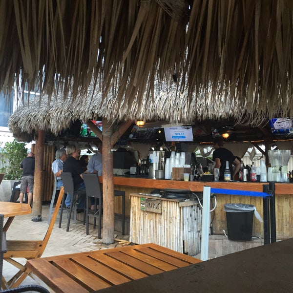 Foto diambil di Bamboo Beach Tiki Bar &amp; Cafe oleh Nouffert R. pada 4/25/2016