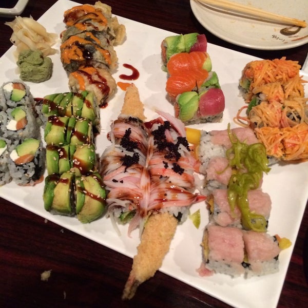 Photo taken at Sushi Kingdom by Zach B. on 10/25/2014