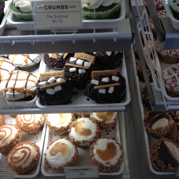 Photo taken at Crumbs Bake Shop by Helen C. on 3/11/2013