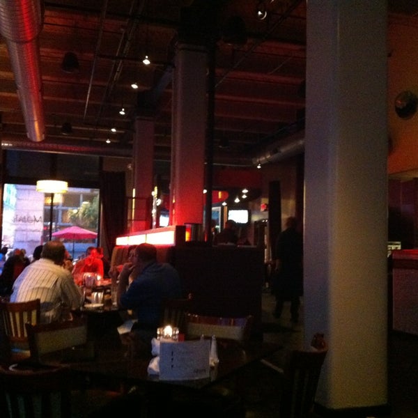 Photo taken at Mosaic Restaurant &amp; Lounge by Chris S. on 5/16/2013