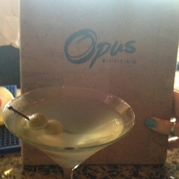 Photo taken at Opus Bistro by Paige S. on 6/1/2013