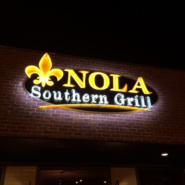 รูปภาพถ่ายที่ Nola Southern Grill โดย Ryan B. เมื่อ 12/31/2013