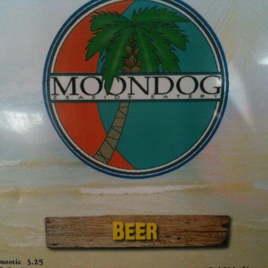 Photo taken at Moondog Seaside Eatery by Kelly Hall B. on 6/8/2014