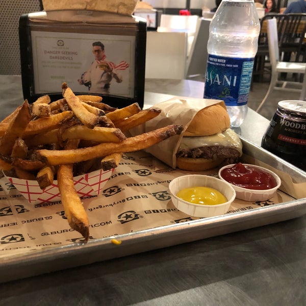 Photo taken at BurgerFi by Steven A. on 2/19/2018