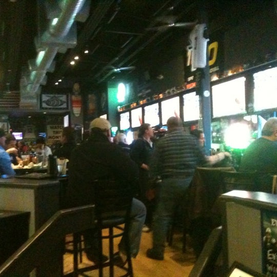 Photo taken at 1st and 10 Sports Bar &amp; Grill by Jim H. on 1/5/2013