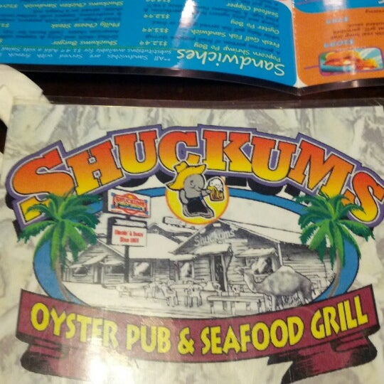 Photo taken at Shuckums Oyster Pub &amp; Grill by Josh S. on 6/15/2012
