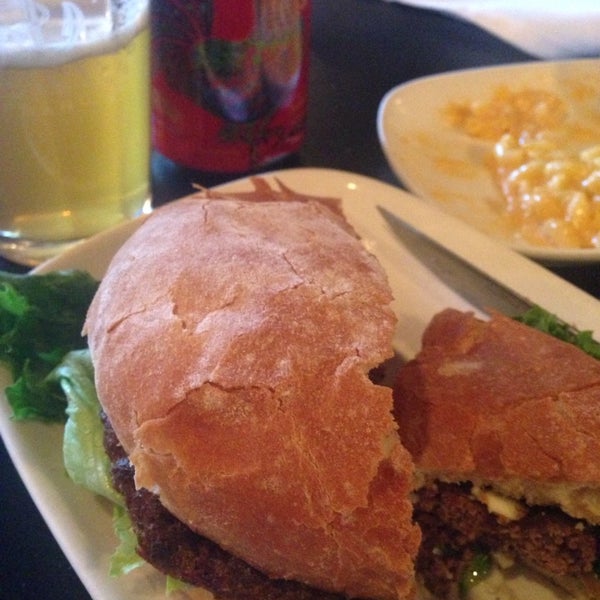 Photo taken at Buzz Burgers, Barrels &amp; Beer by Jessica G. on 3/12/2014