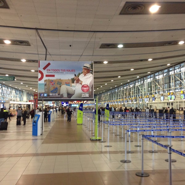 Photo taken at Comodoro Arturo Merino Benitez International Airport (SCL) by Justin R. on 4/30/2015