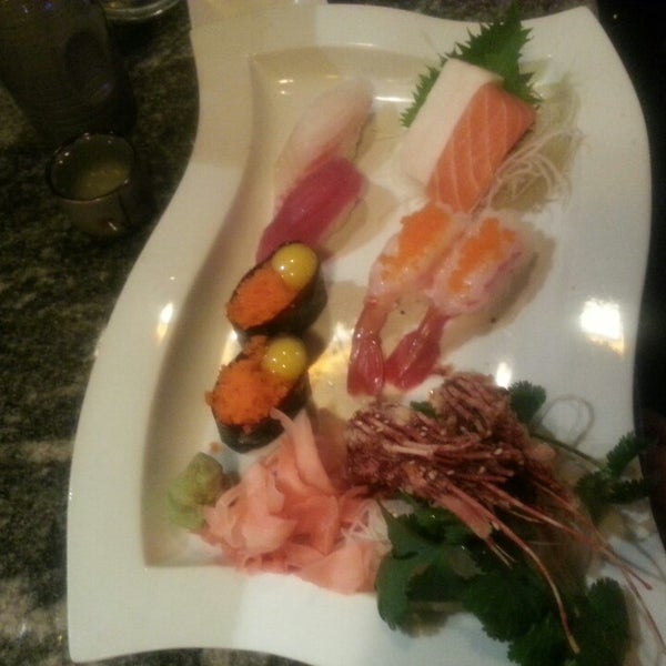 Photo taken at Kassai Sushi by Elizabeth G. on 3/13/2013