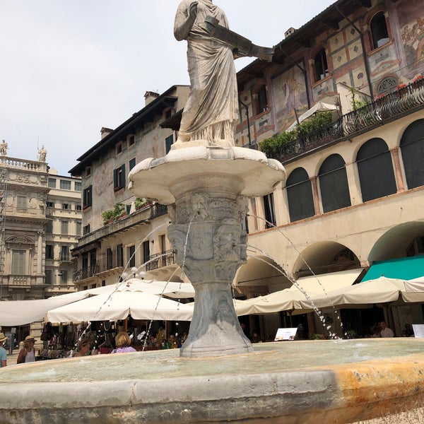 Photo taken at Piazza delle Erbe by Jon S. on 6/16/2022