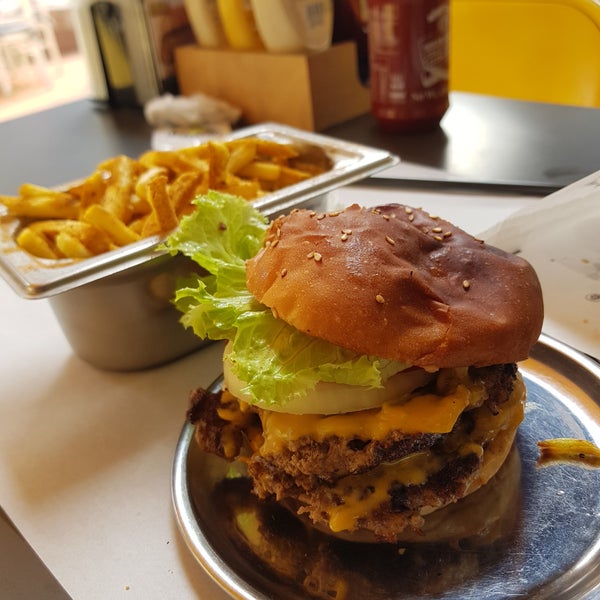 Photo taken at Dobby&#39;s Burger Place by Egemen on 10/3/2018