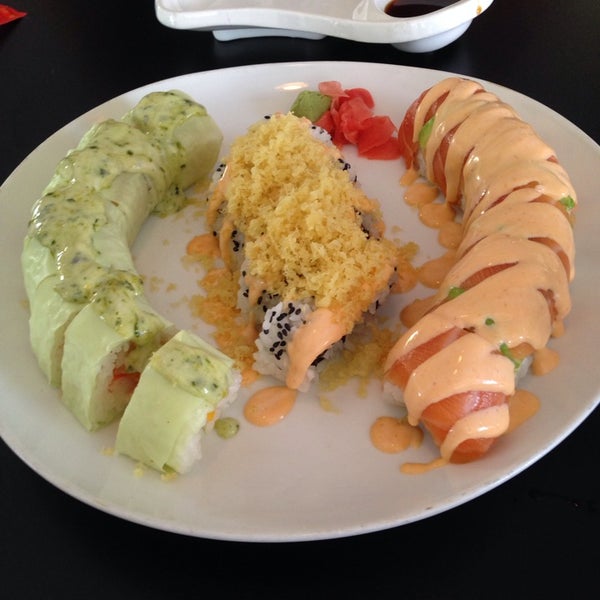 Photo taken at Nigiri Sushi Bar &amp; Restaurant by Adriana C. on 12/17/2013