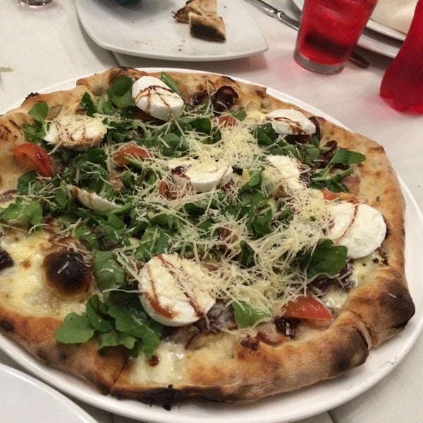 Photo taken at Da Luigi Trattoria Pizzeria by Oscar C. on 6/23/2014