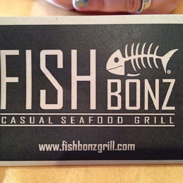 Photo taken at FishBonz Grill by Carlos T. on 10/24/2013