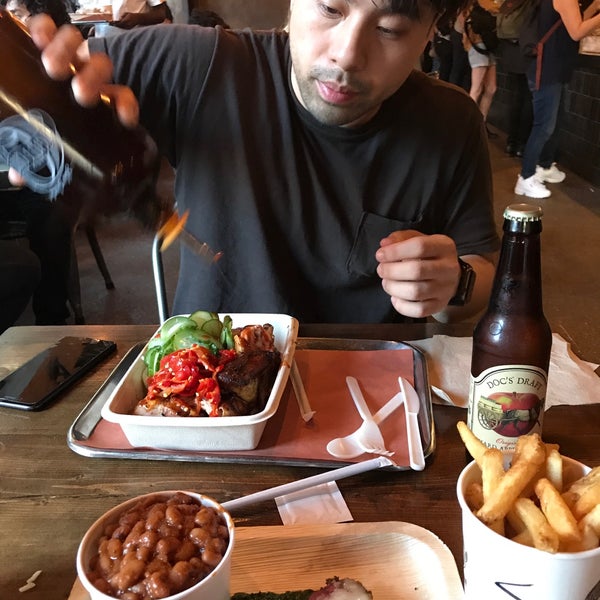 Photo taken at Mighty Quinn&#39;s BBQ by Cyrus L. on 6/21/2019