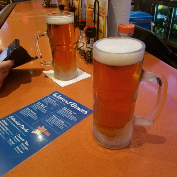 Photo taken at Hooters by Eric F. on 7/23/2019
