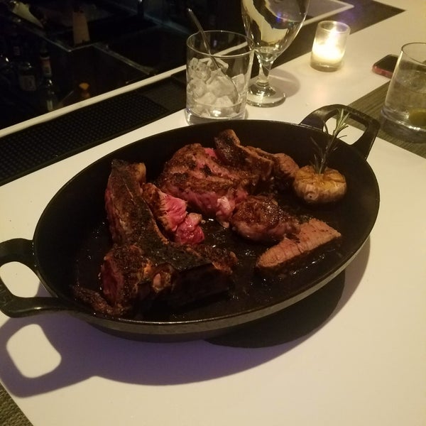 Photo taken at T-Bar Steak &amp; Lounge by Eric F. on 2/22/2020