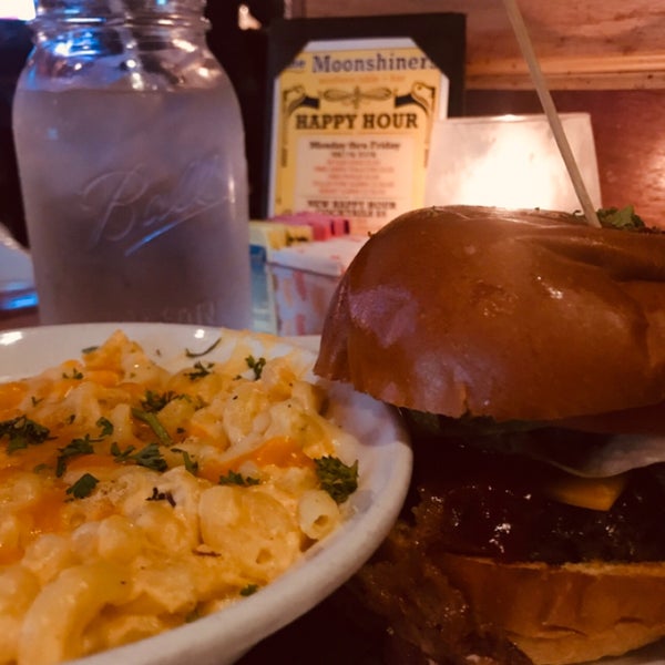 Photo taken at The Moonshiners Southern Table + Bar by ariq d. on 11/2/2018