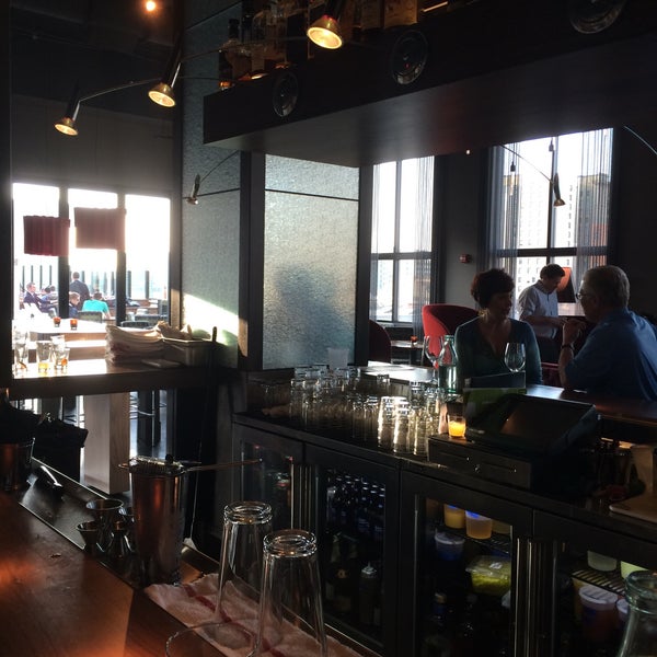 Photo taken at 8UP Elevated Drinkery &amp; Kitchen by Alice S. on 4/9/2015