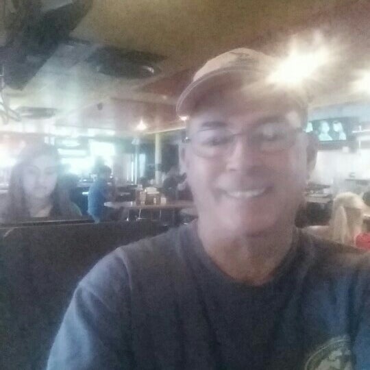 Photo taken at Rookies Sports Bar and Grill by Larry B. on 8/7/2015