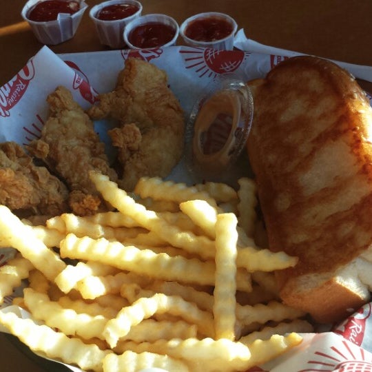 Photo taken at Raising Cane&#39;s Chicken Fingers by Jen C. on 1/19/2014