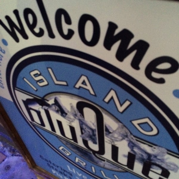 Photo taken at Blu Que Island Grill by Austin W. on 3/15/2014