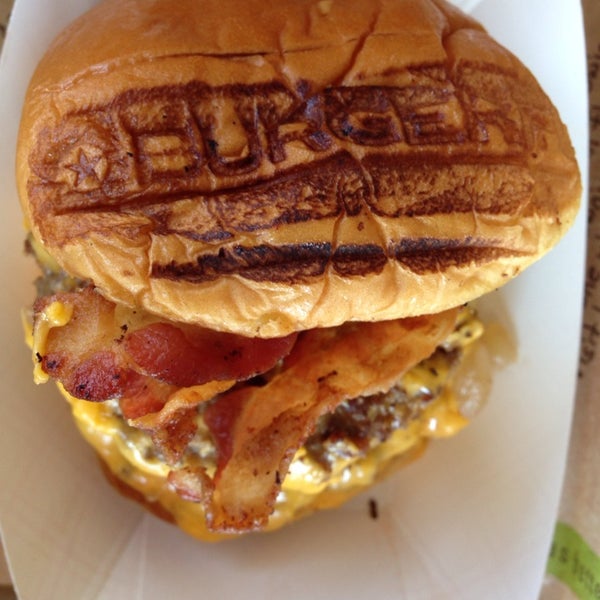 Photo taken at BurgerFi by Eric S. on 8/25/2013