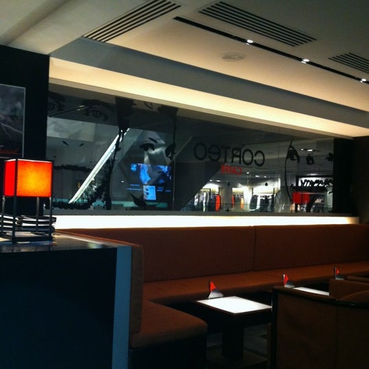 Photo taken at EMPORIO ARMANI CAFFE by Sergey G. on 11/11/2012