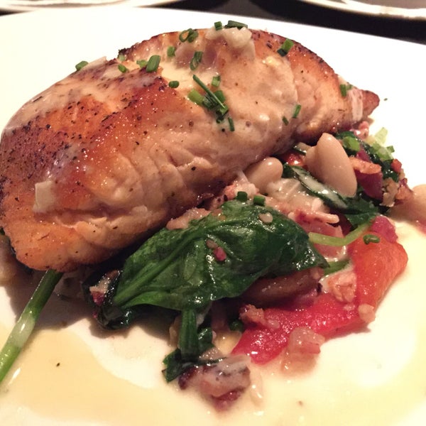 Off HRW menu SALMONpan-seared salmon filet served on a bed of slowly braised cannellini beans with applewood smoked bacon and sautéed spinach. Melton your mouth good. Highly recommend this dish.