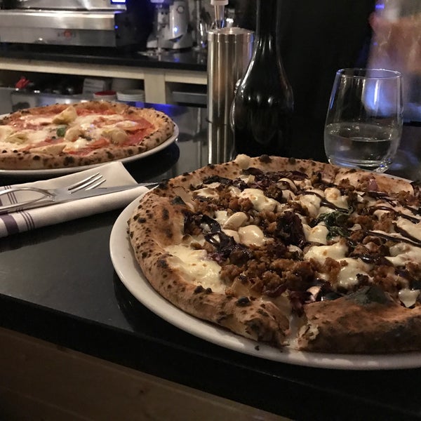 Photo taken at Sottocasa Pizzeria by Andrew F. on 3/8/2017