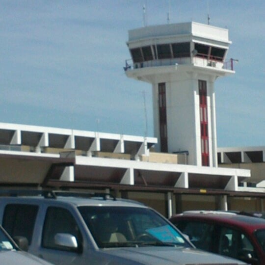 Photo taken at Philip S.W. Goldson International Airport (BZE) by Micah J C. on 10/17/2012