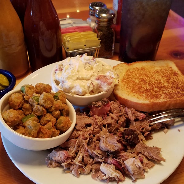 Pork BBQ (chopped), with the Vinegar based sauce, and deviled egg potato salad, plus fried okra, and a Cue' ice cold sweet tea, oh, and a toasted slice of their homemade bread- Boom goes the Dynomite!