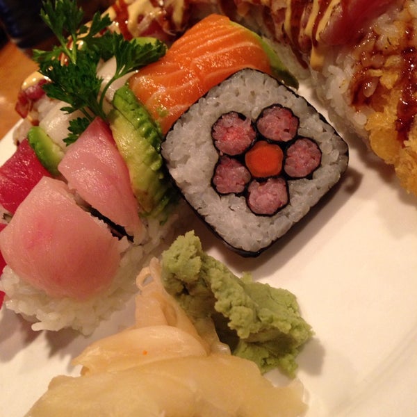 Photo taken at Mura Japanese Restaurant by Chris S. on 9/17/2014