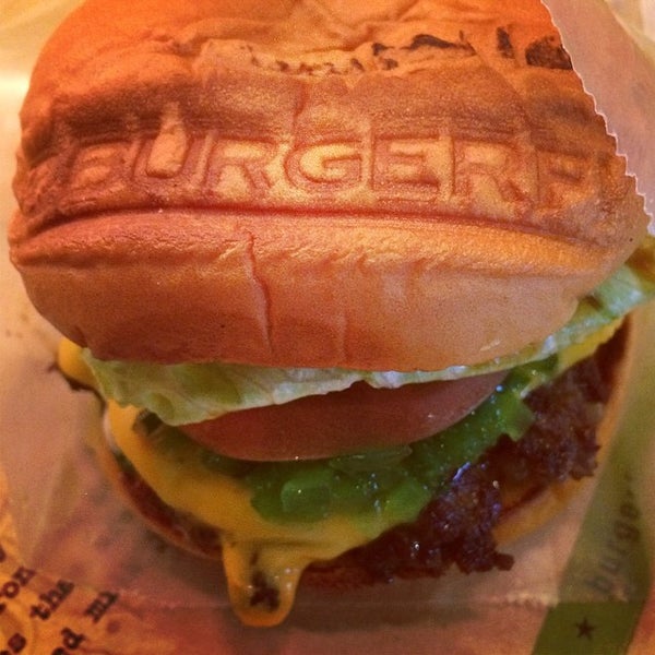 Photo taken at BurgerFi by Emilia F. on 3/21/2014